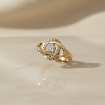 Zlatý přívěsek se spleteným zirkonem